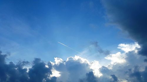 Low angle view of vapor trail in sky