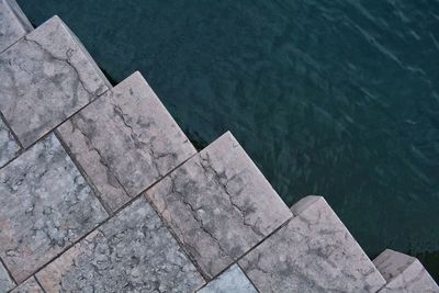 Directly above view of pier in lake garda