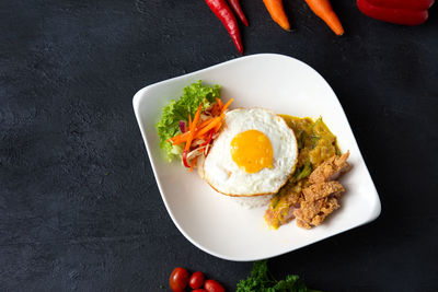 High angle view of breakfast served in plate