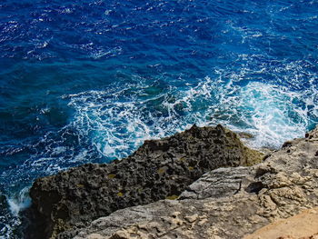 High angle view of rocks on beach