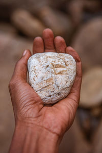 Cropped hand holding heart shape