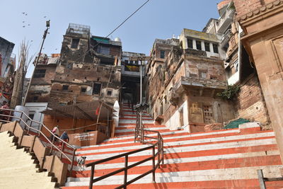 Low angle view of old buildings against sky