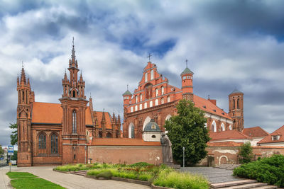 Low angle view of cathedral against cloudy sky