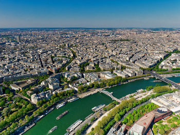 High angle view of river amidst buildings in city