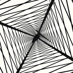 Low angle view of cables against sky