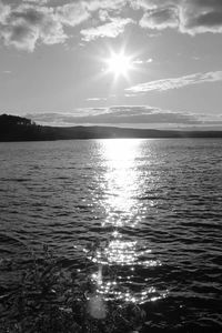 Sun shining over sea