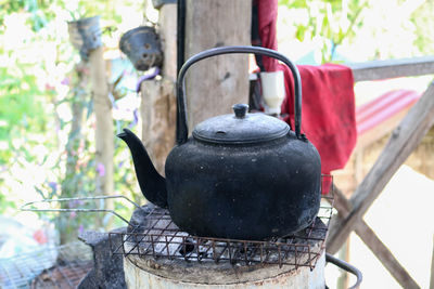 Close-up of black coffee in container