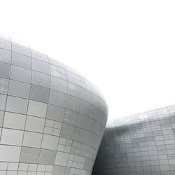 Low angle view of modern building against clear sky