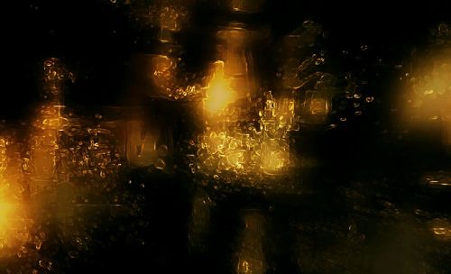 Close-up of illuminated water at night