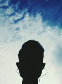 Low angle view of woman against clear sky