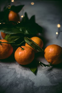 Close-up of oranges on table