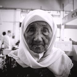 Close-up portrait of senior woman wearing hijab