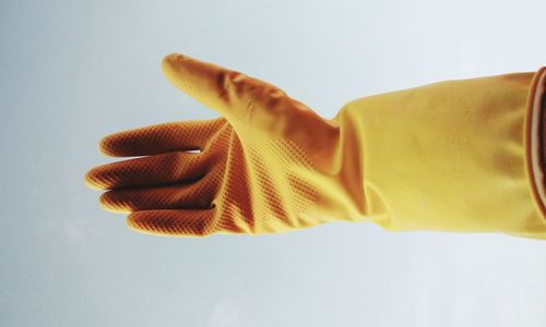 Close-up of human hand against white background