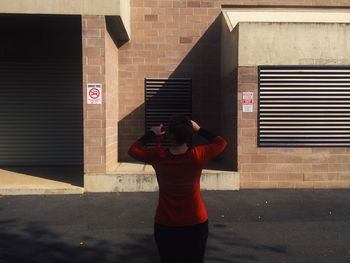 Woman standing in city