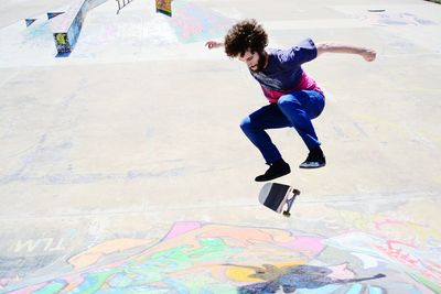 Man skateboarding in park