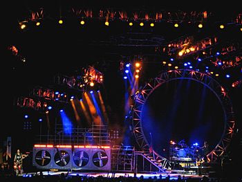 Illuminated ferris wheel at night