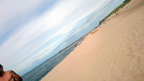 Scenic view of beach against sky