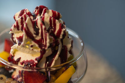 Close-up of ice cream with fruits in bowl