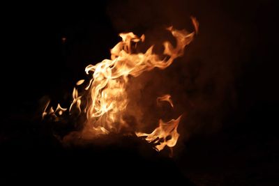 Close-up of fire in the dark