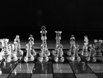 Full frame shot of chess board against black background