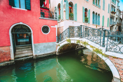 Arch bridge over canal in city