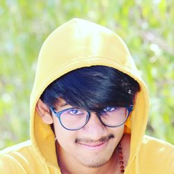 Close-up portrait of a smiling young man