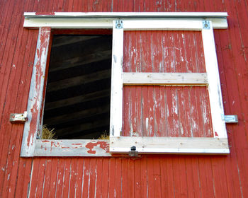 Low angle view of window on old building