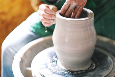 Close-up of hand holding ice cream