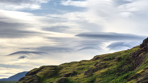 Part of the the langdales gives the backdrop to cloud formations during sunset in the english lake district