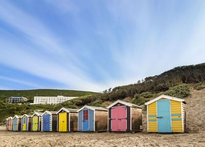 Multi colored huts at beach