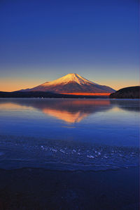 A world heritage site mt.fuji reflection in lake yamanaka