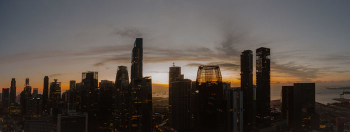 Panoramic view of downtown singapore skyline during sunrise