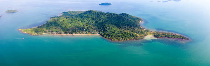 Aerial view of island amidst sea