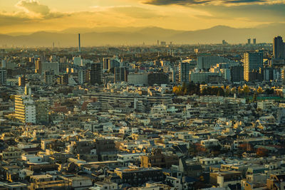 High angle view of cityscape against sky during sunset