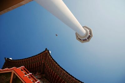 Low angle view of building against blue sky