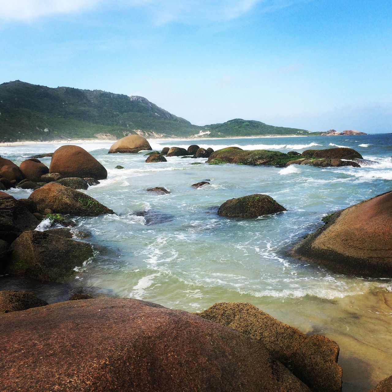 sea, water, beach, scenics, shore, tranquil scene, beauty in nature, tranquility, rock - object, wave, nature, sky, horizon over water, coastline, surf, idyllic, sand, rock formation, rock, outdoors