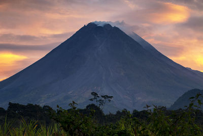 Scenic view of mountains against sky during sunset