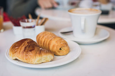 Close-up of breakfast served on table