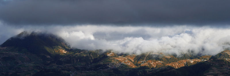 Panoramic view of clouds over mountains