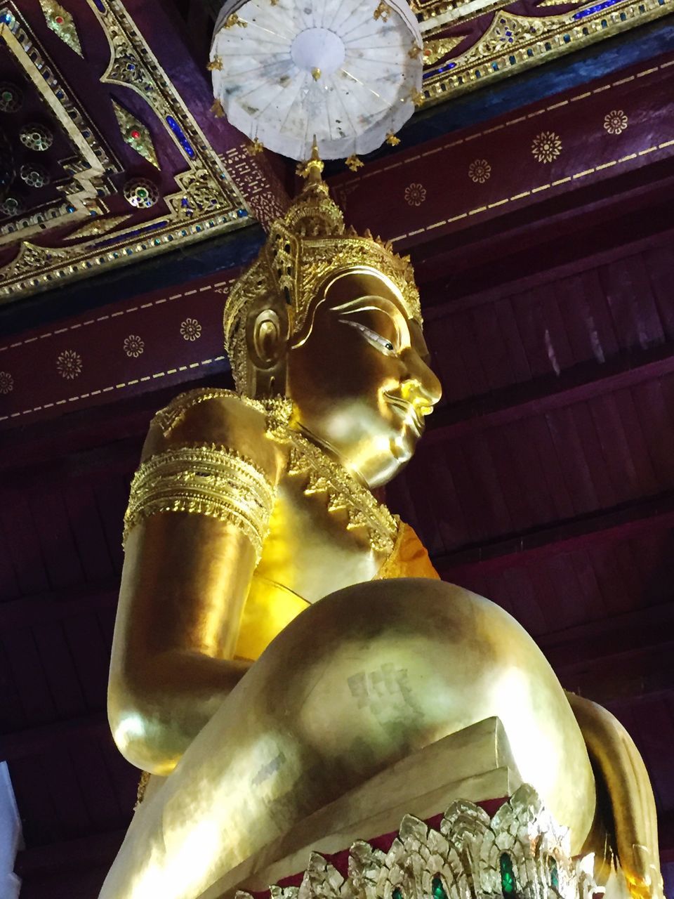 gold colored, gold, place of worship, spirituality, low angle view, religion, no people, indoors, architecture, statue, day