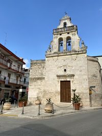 Low angle view of historic building against clear sky