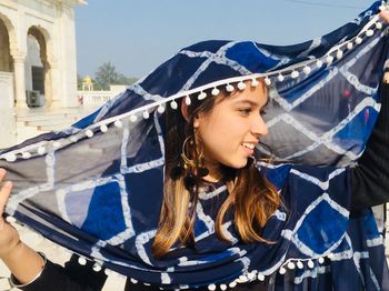 Beautiful young woman wearing headscarf