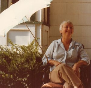 Close-up of woman standing on wall