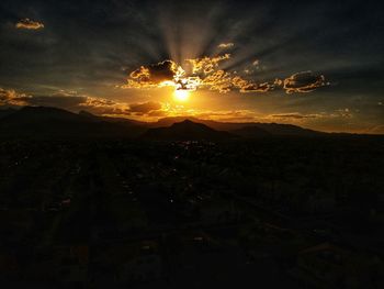 Scenic view of silhouette landscape against sky during sunset