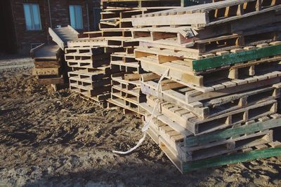 Stack of firewood by building