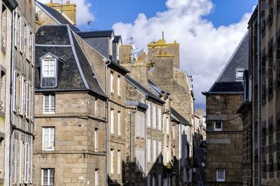 Low angle view of residential buildings against sky