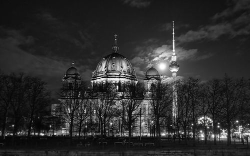 Illuminated buildings in city at night