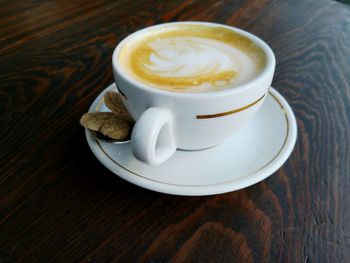 High angle view of cappuccino on table