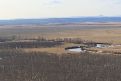 Scenic view of land against sky