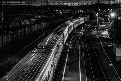 High angle view of railroad tracks at night